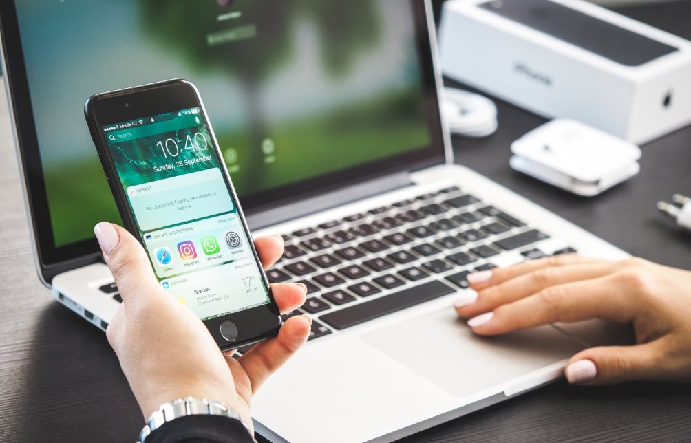 using an iPhone and a laptop